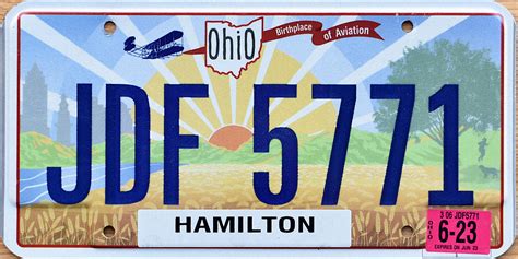 12 - black on orange. . Ohio license plate sticker colors 2023